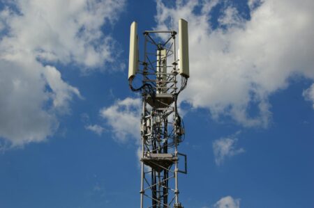 How Microsoft’s Cloud Gaming Is Finally Reaching Rural Internet Users Telecommunications tower in rural countryside providing broadband internet access