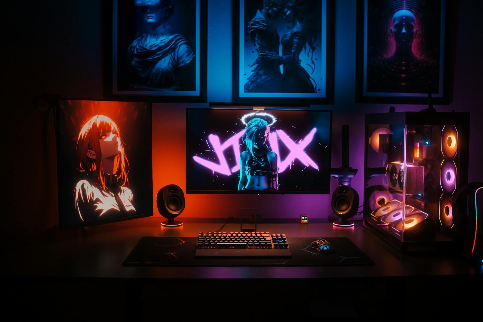 Modern gaming setup with multiple monitors and streaming equipment