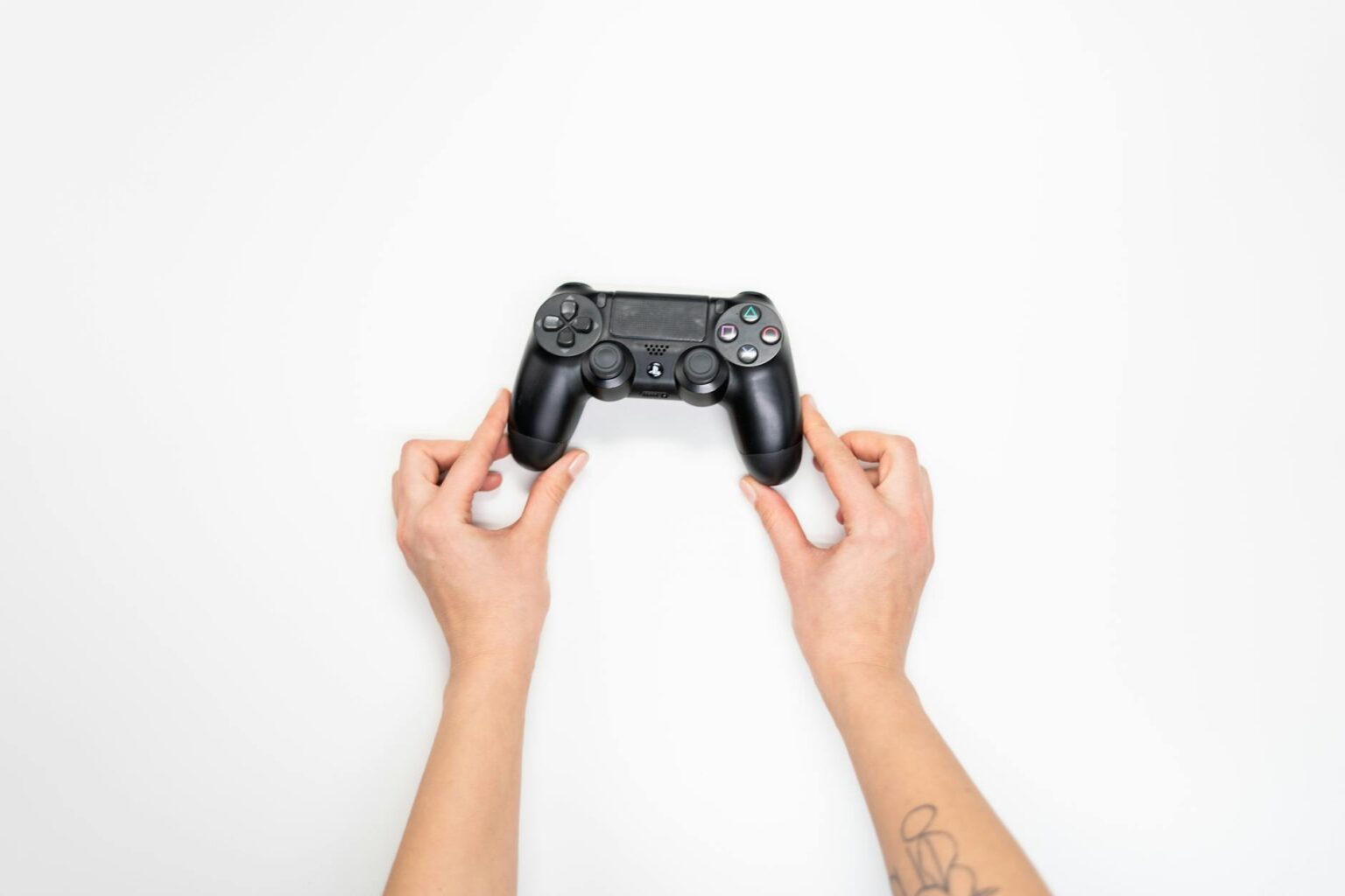 Steam Deck Competition Pushes Sony Toward Portable Gaming Revival Portable gaming device being held in hands showing screen and controls