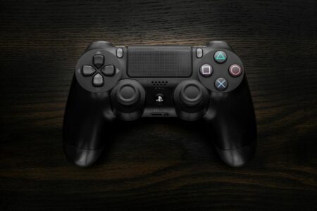 Gaming controller with security lock symbol representing account protection features