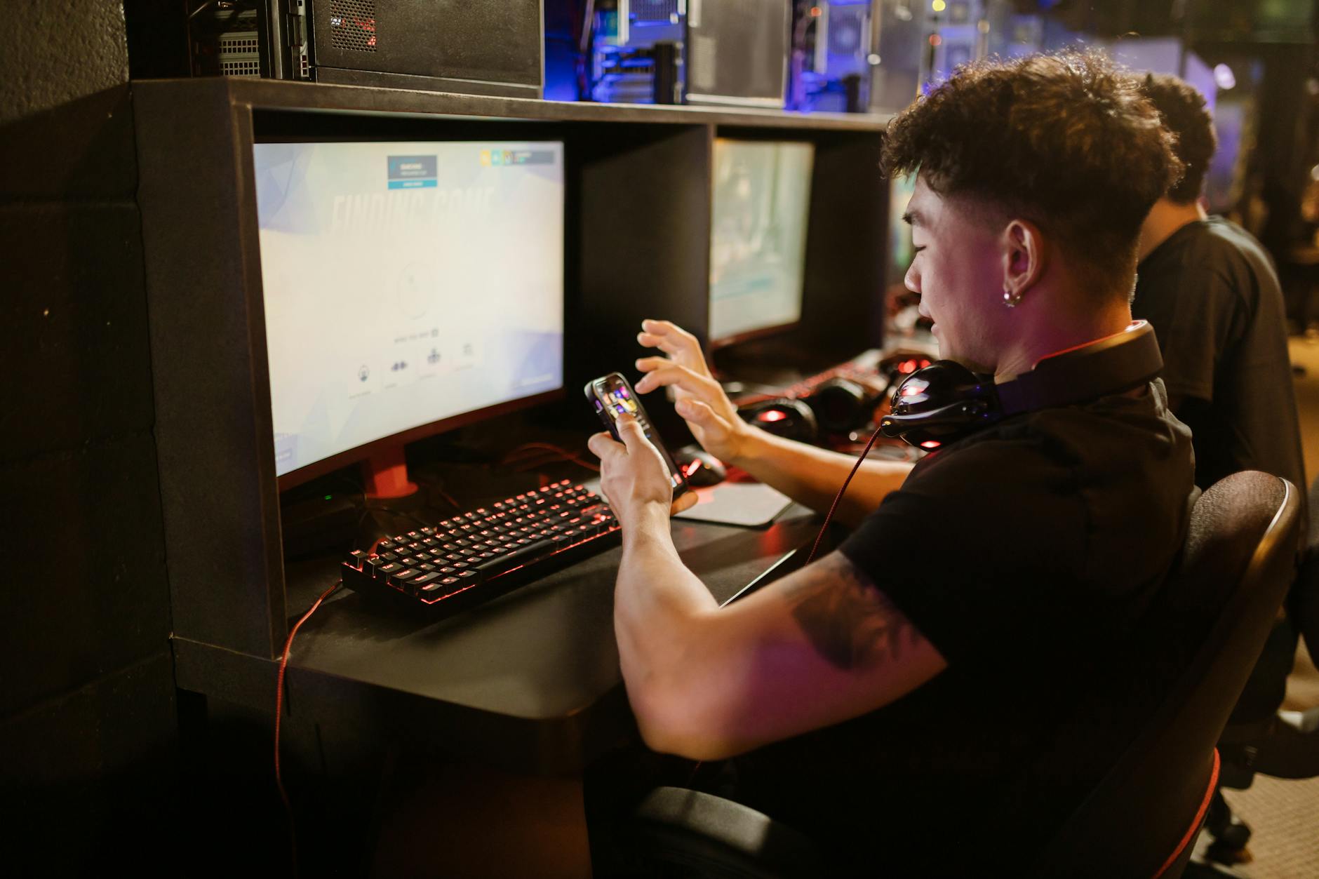 Mobile phone displaying gaming content on screen with colorful interface