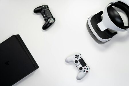 PlayStation gaming console on entertainment center showing digital interface