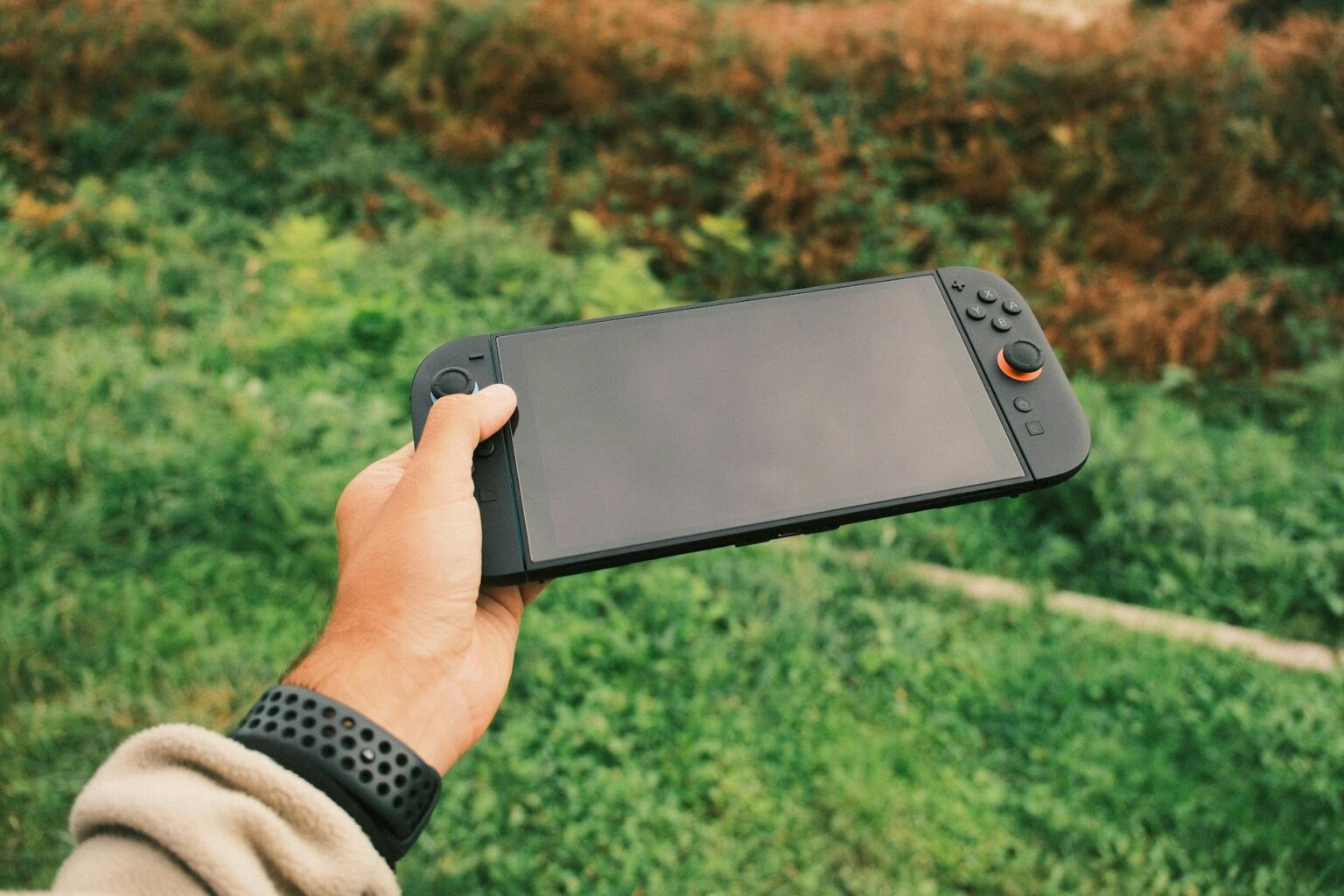 Why Steam Deck Competitors Are Struggling to Match Valve’s Success Modern handheld gaming device on dark surface showing competitive gaming market