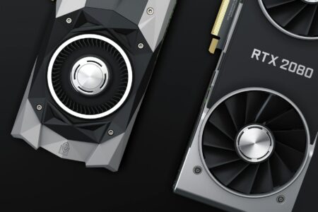Modern graphics card installed in PC motherboard showing GPU cooling system and connectors
