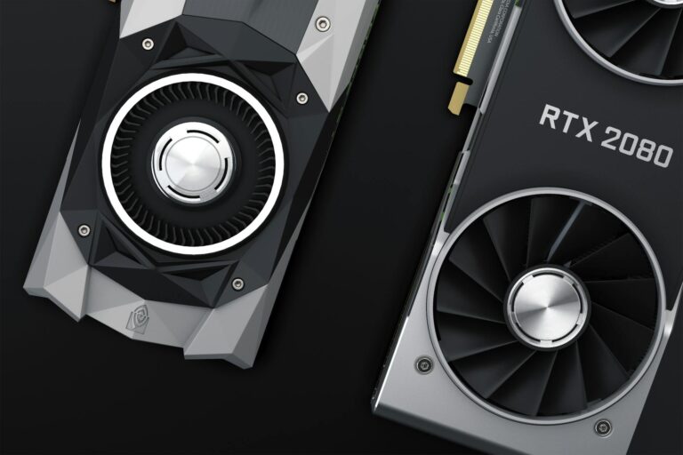 Modern graphics card installed in PC motherboard showing GPU cooling system and connectors