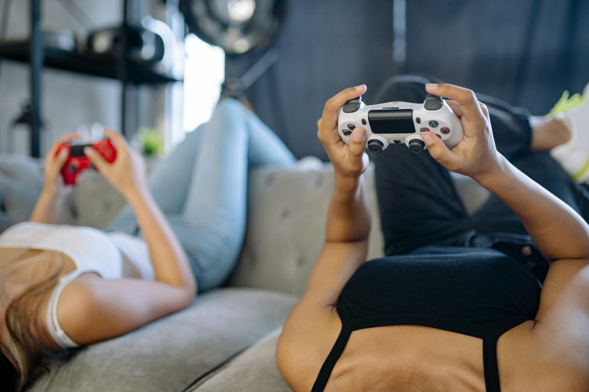 Group of gamers collaborating while playing video games together