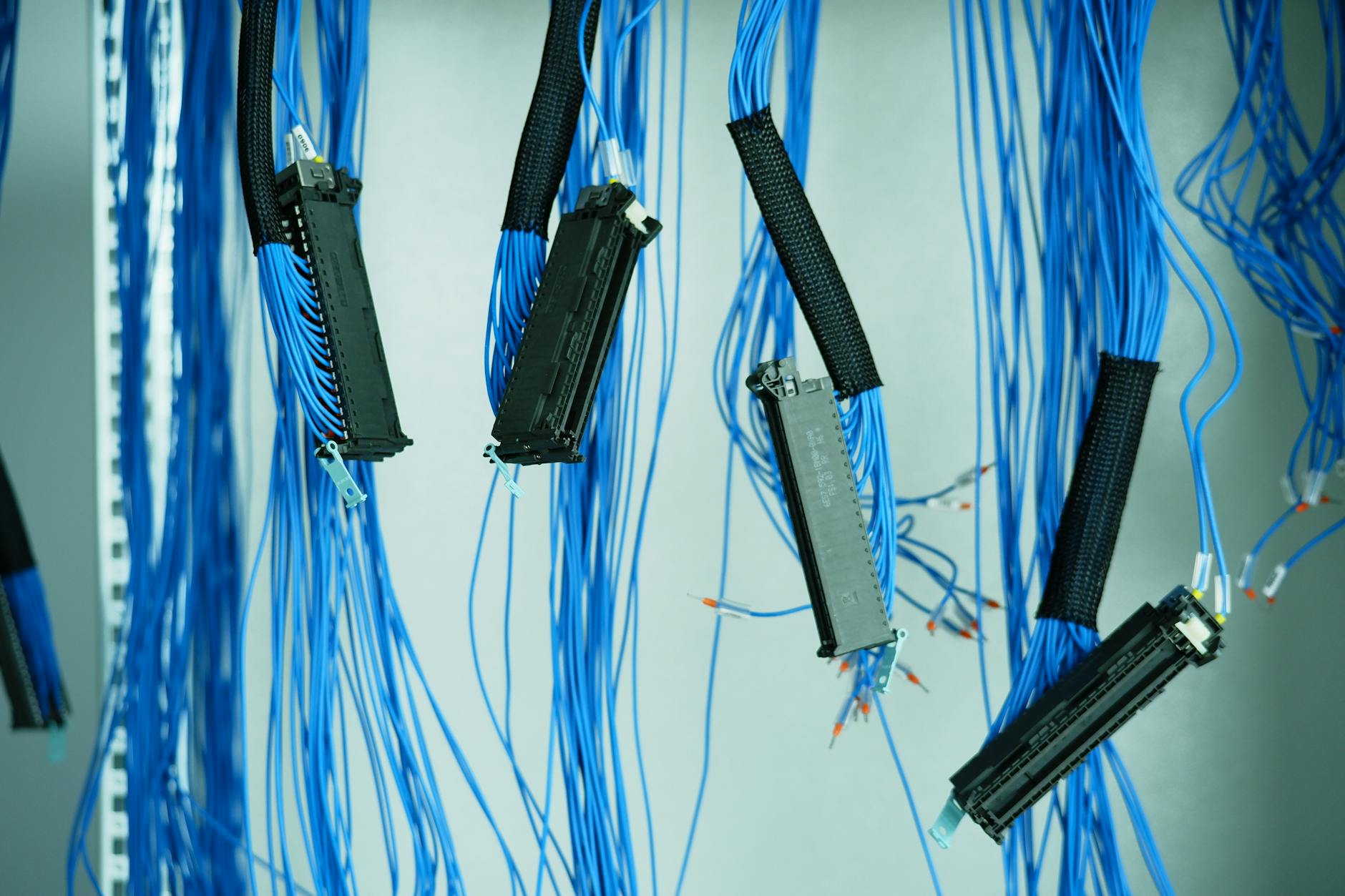 Organized computer cables and power management system showing clean desk organization
