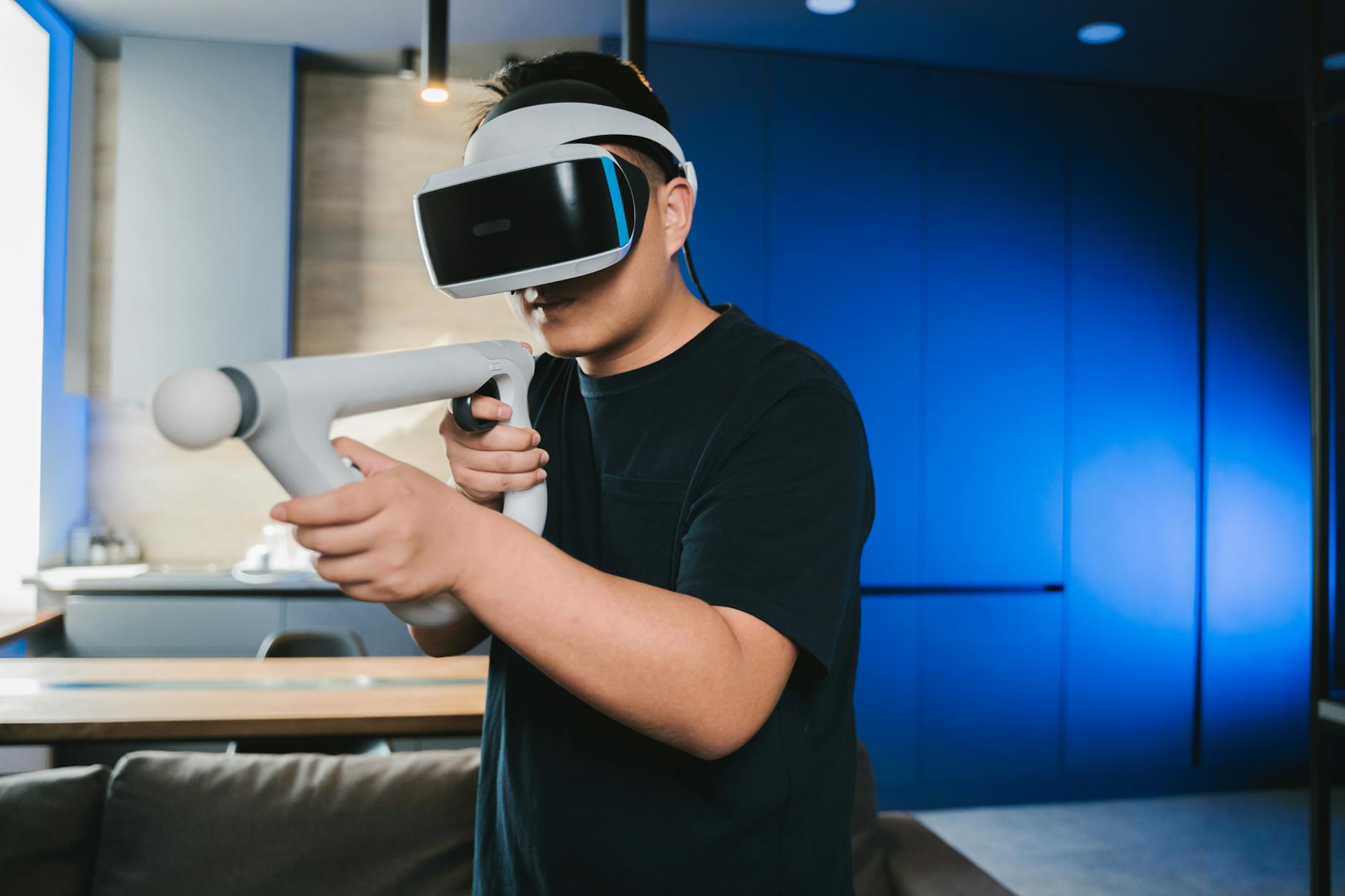 Person holding smartphone displaying augmented reality interface, showcasing mobile AR gaming technology