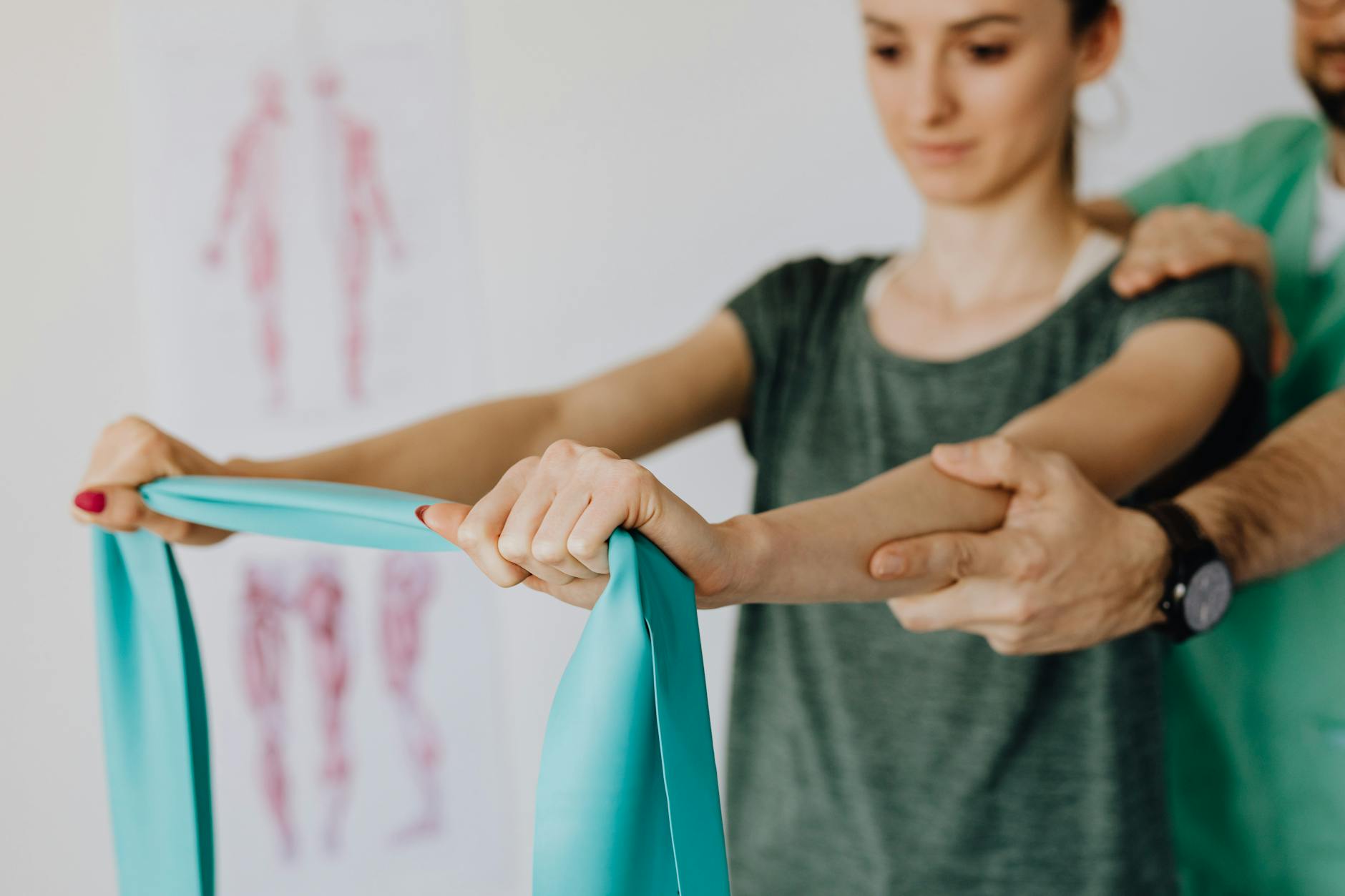Physical therapist working with patient during rehabilitation session