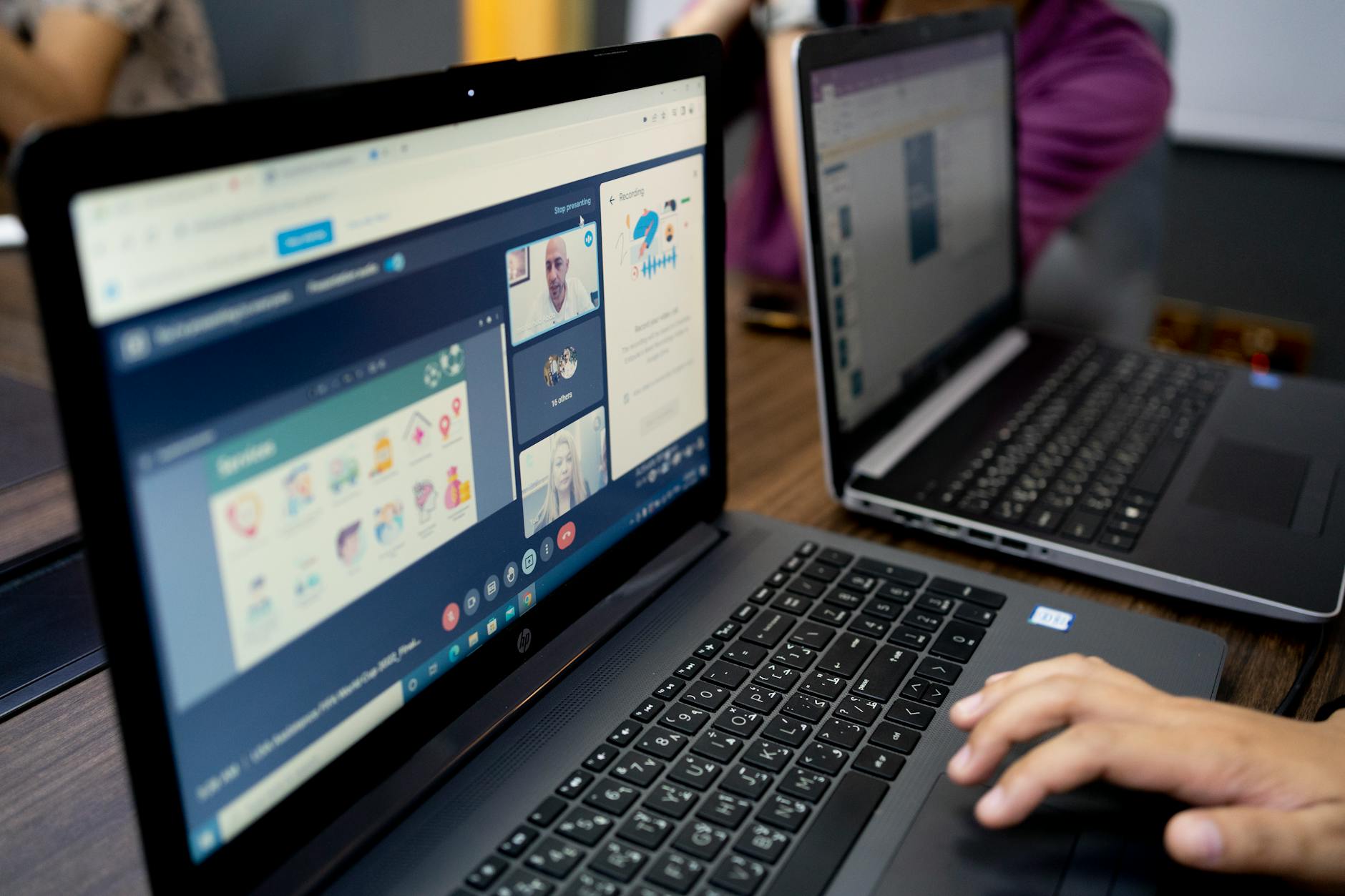 People engaging in online community discussion on computer screens