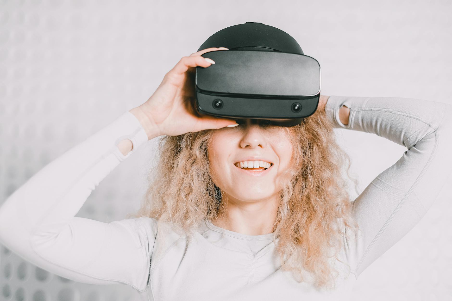 Person wearing virtual reality headset during an immersive fitness workout session