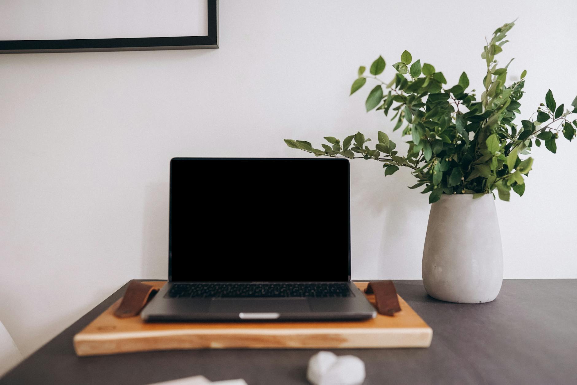 Modern laptop computer on desk workspace setup for productivity