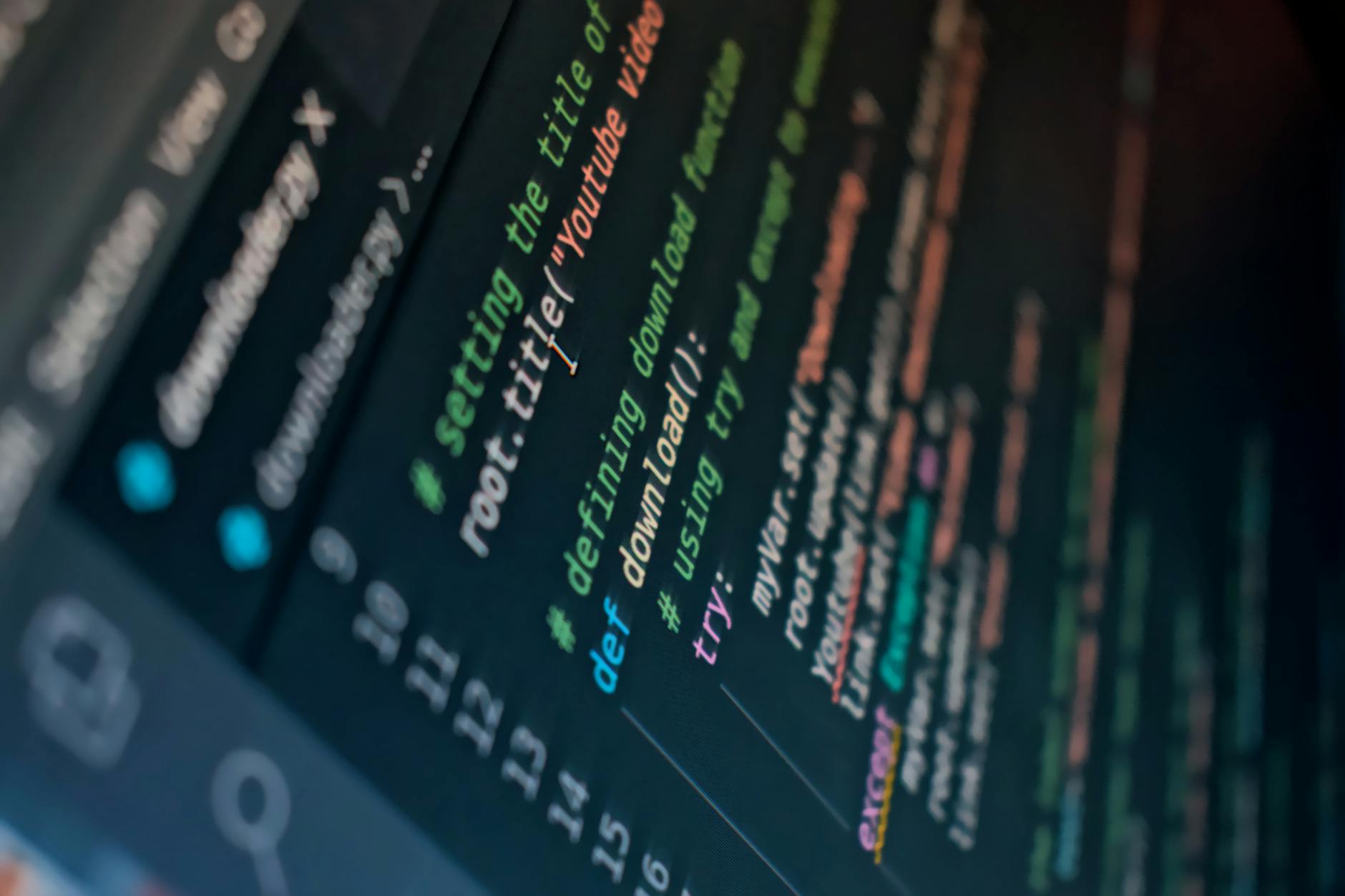Developer working at computer screen showing game development and programming for indie studios