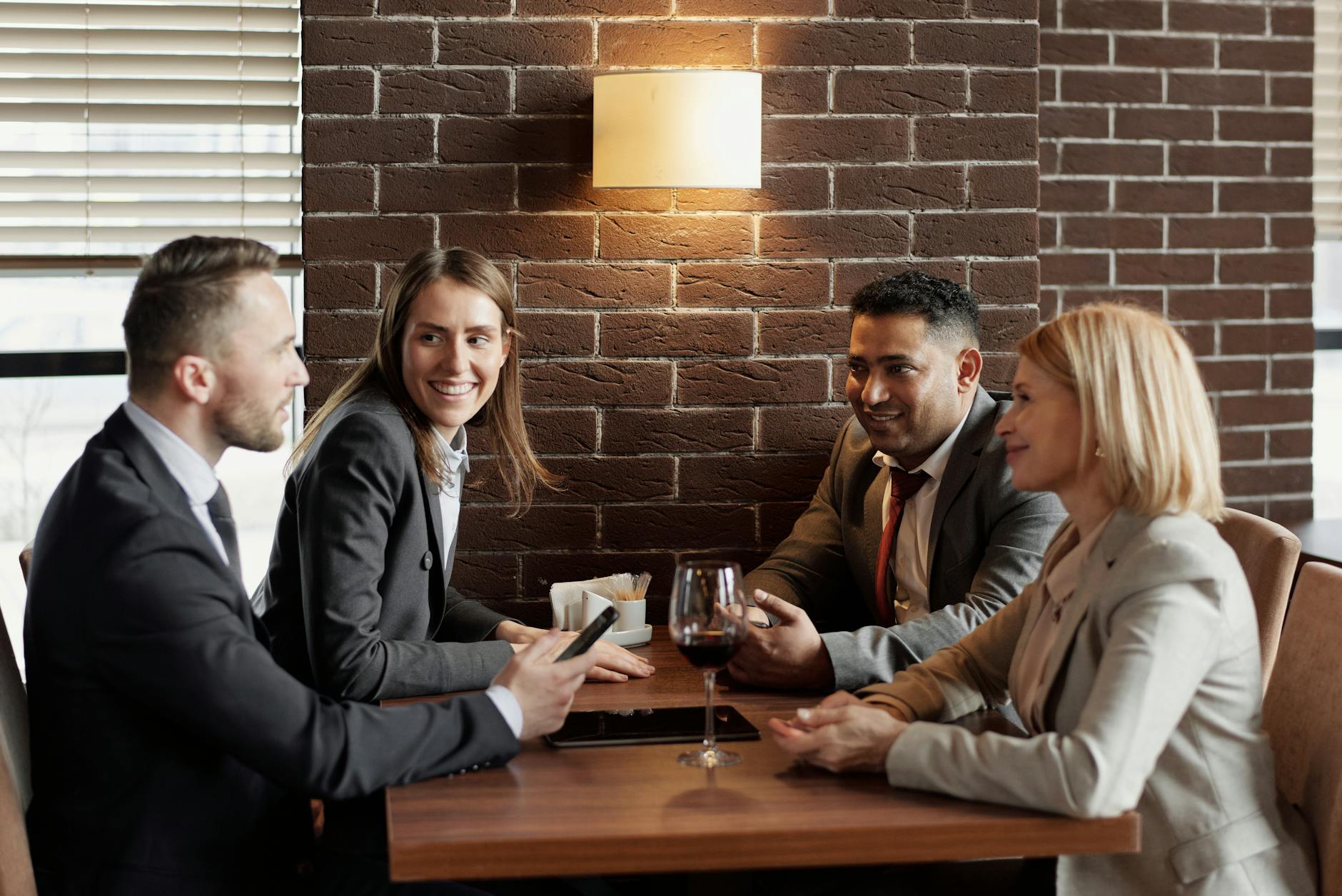 Group of friends having an animated conversation, representing online community interaction