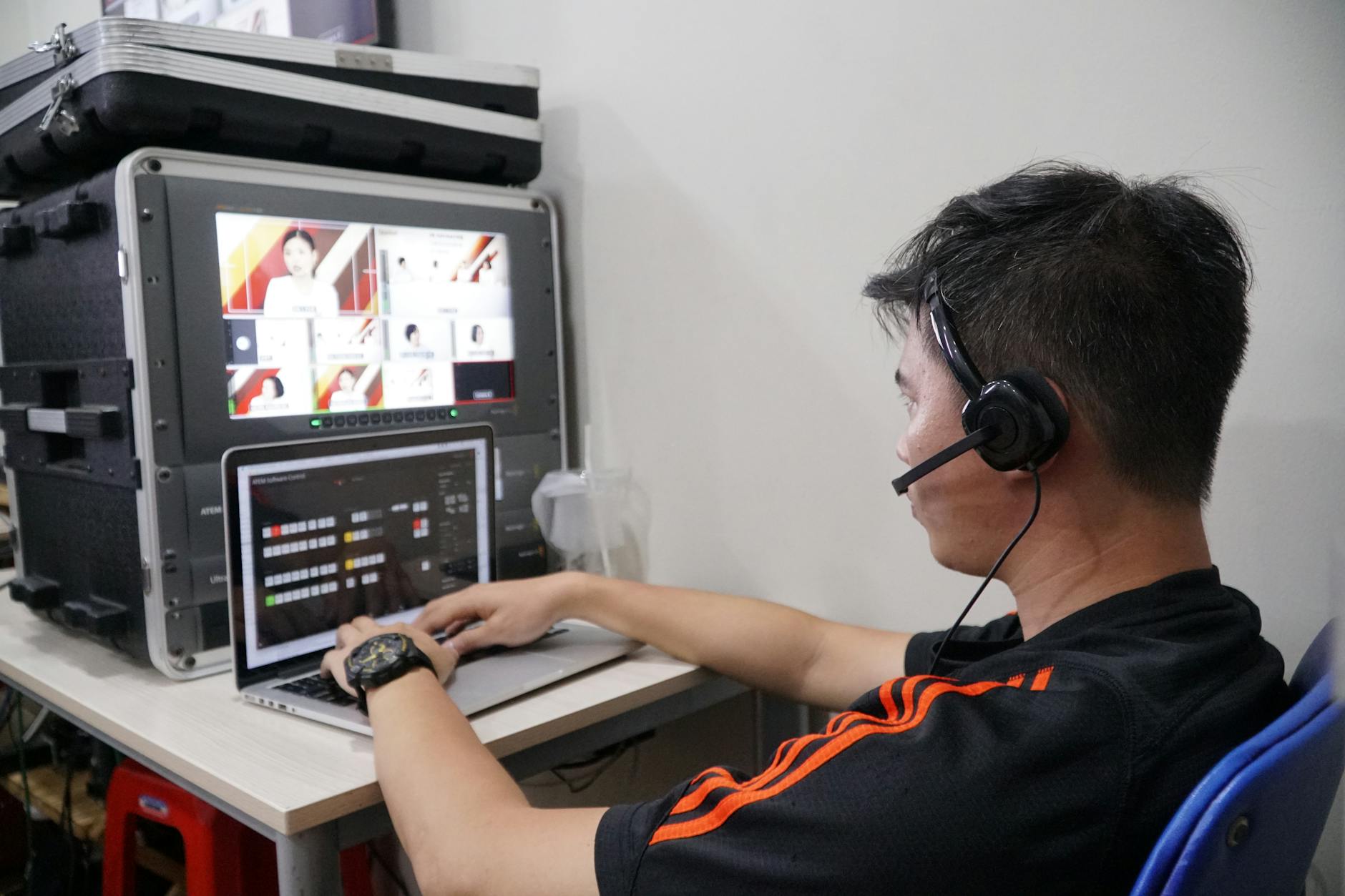 Professional streaming setup with multiple monitors for content creation