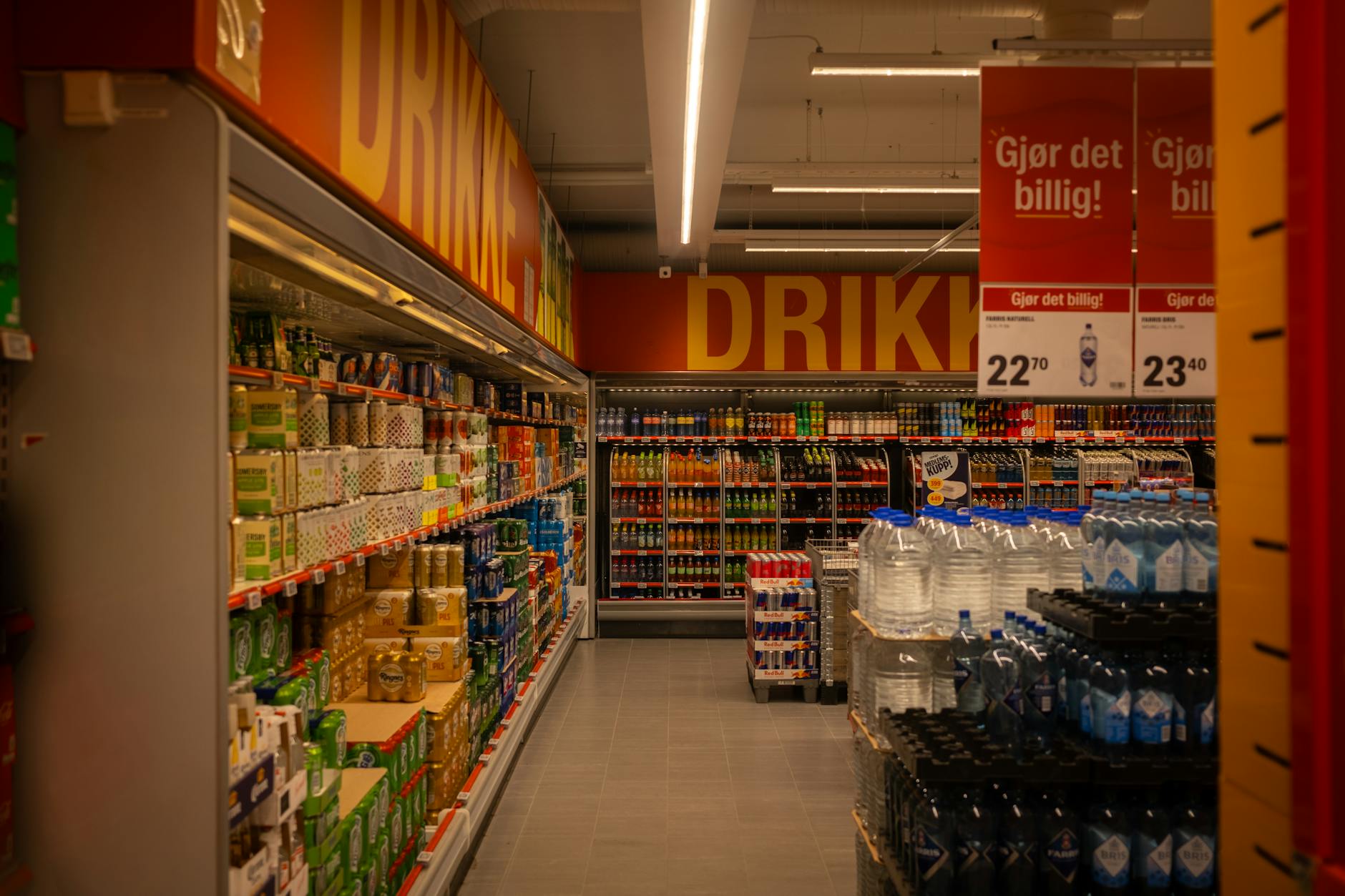 Interior of video game retail store with shelves of physical game cases