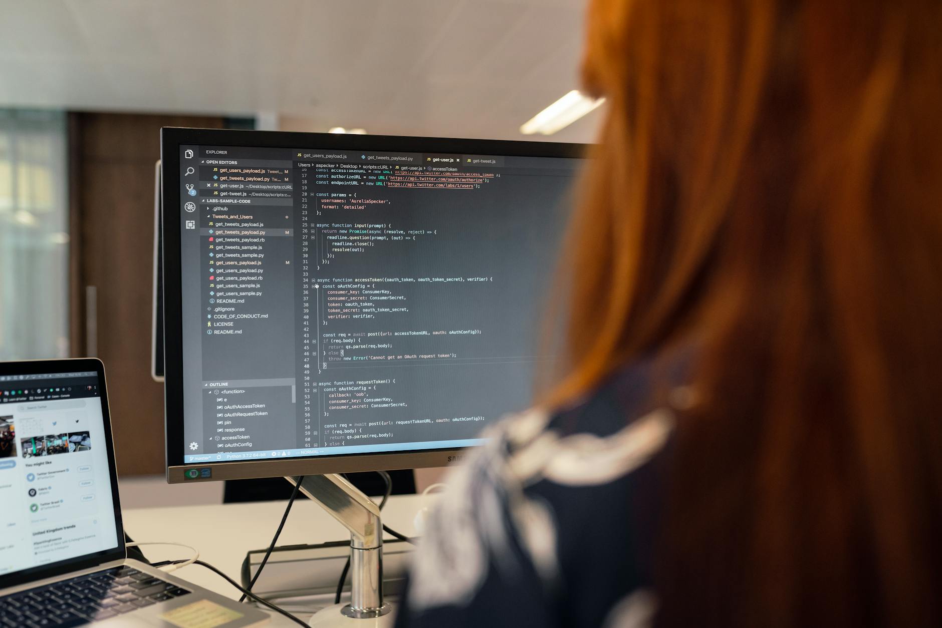 Engineers working on computer hardware development in modern technology laboratory setting