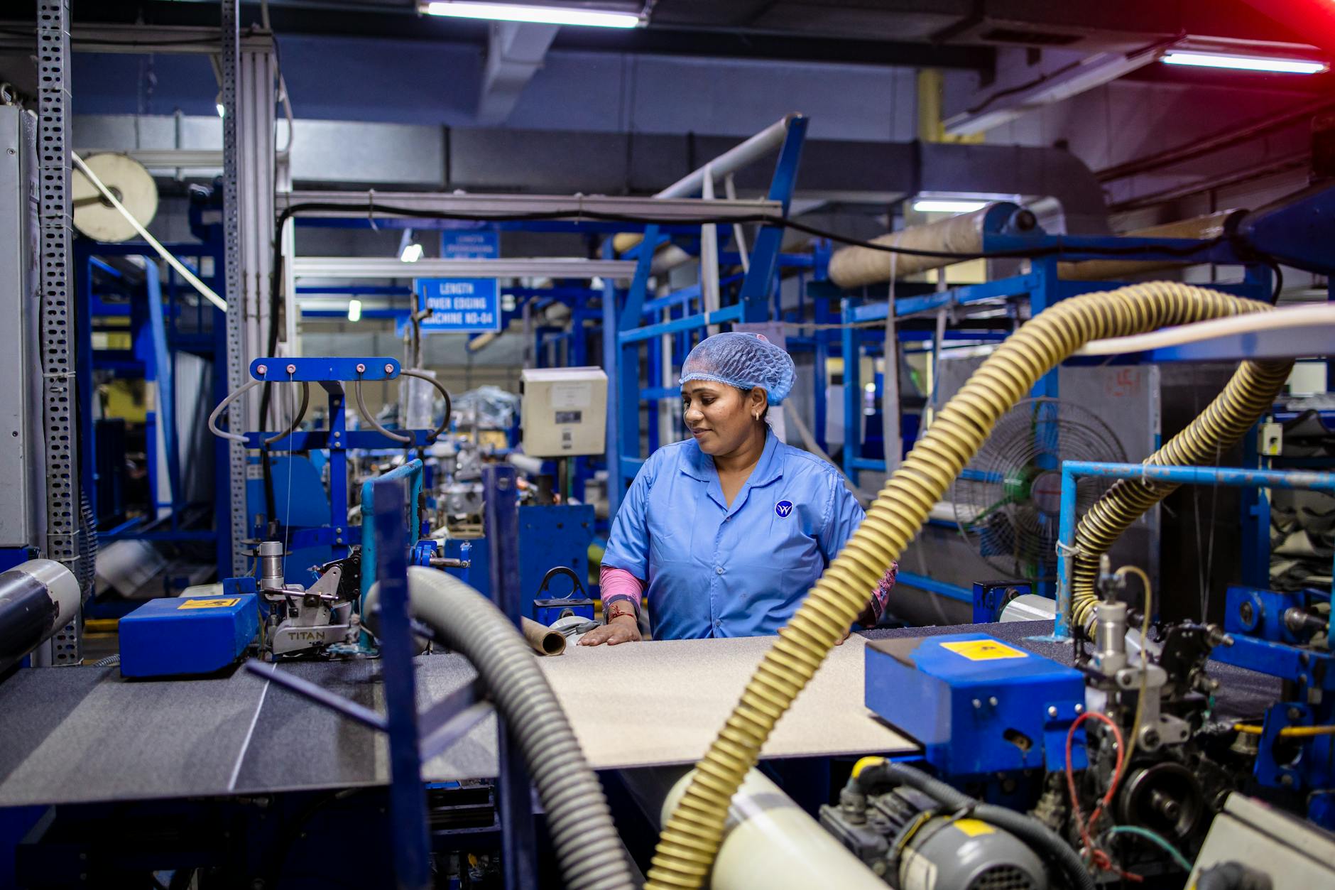 Manufacturing facility floor showing automated production line for electronic components