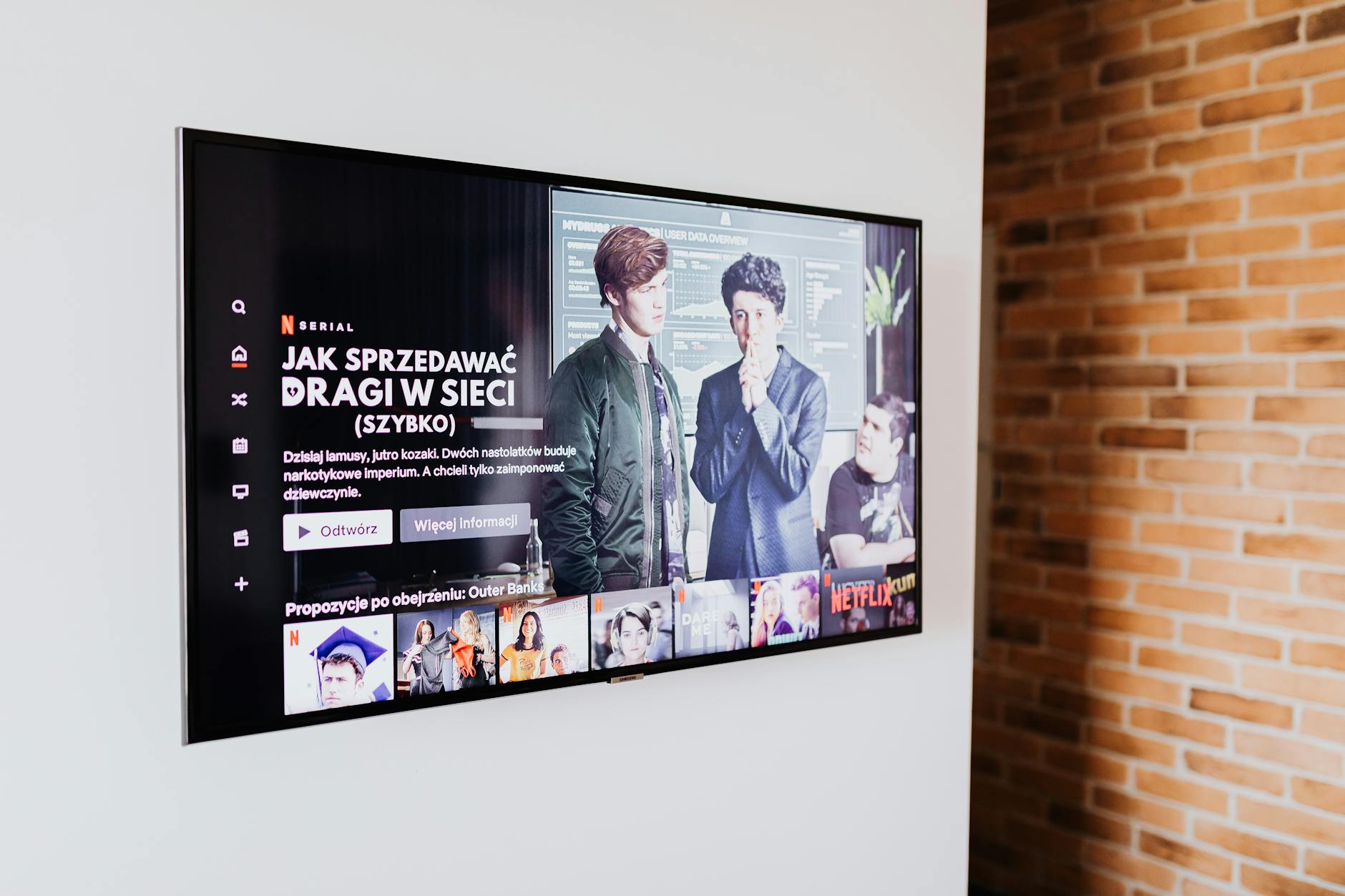 Modern living room with large television and entertainment system