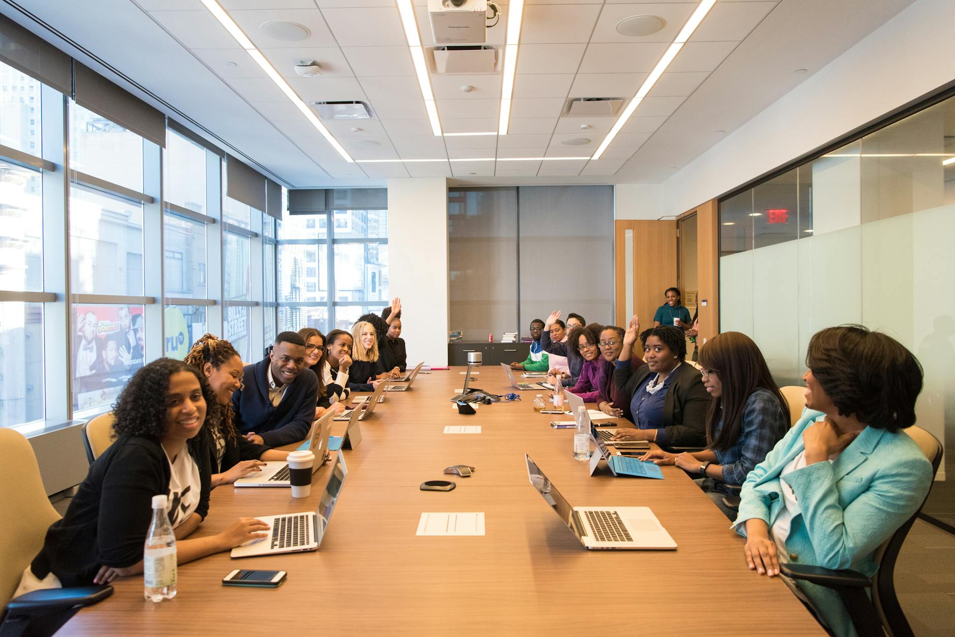 Business professionals collaborating in modern office meeting room