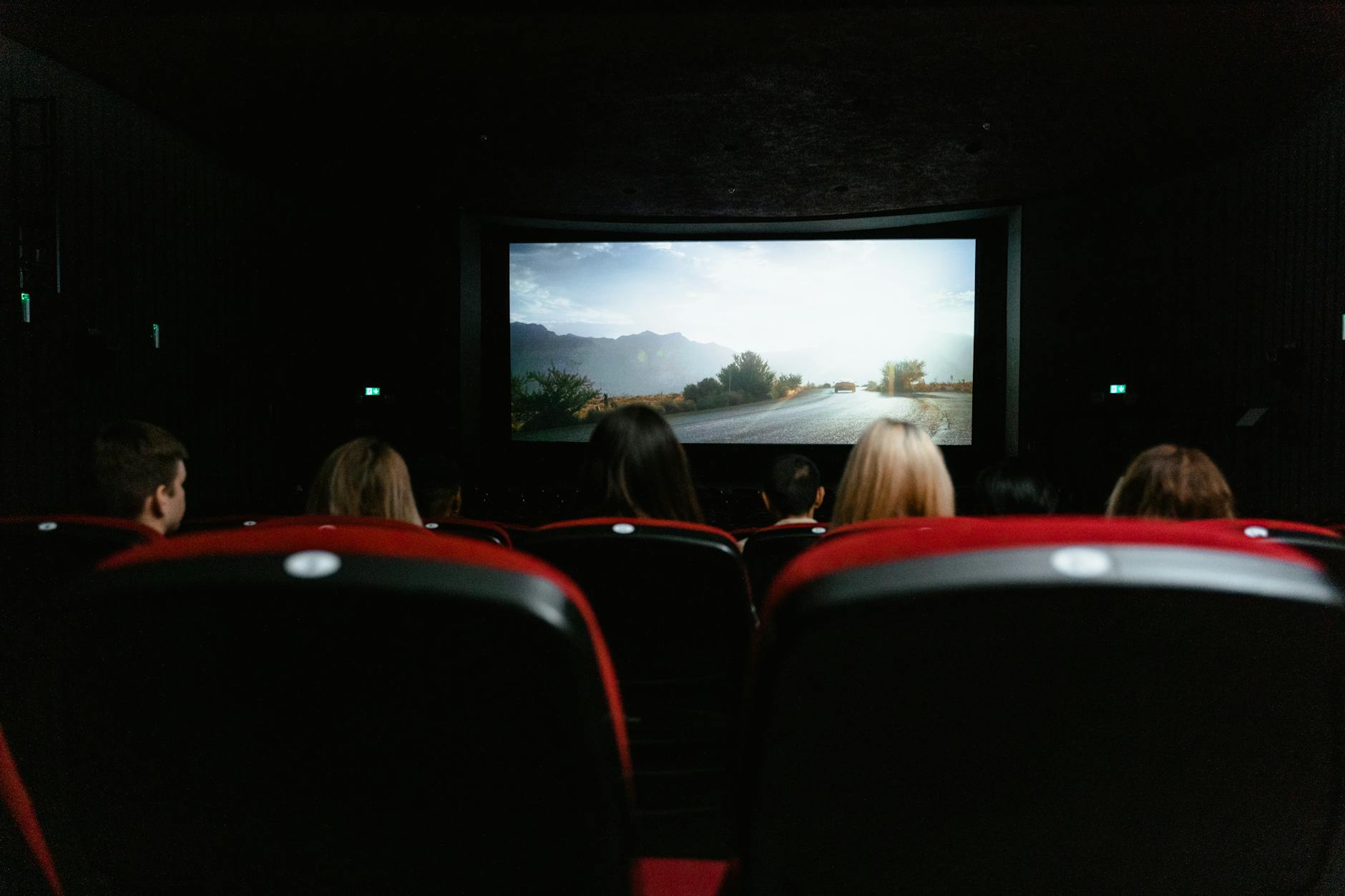 Darkened movie theater or entertainment venue suggesting immersive experience