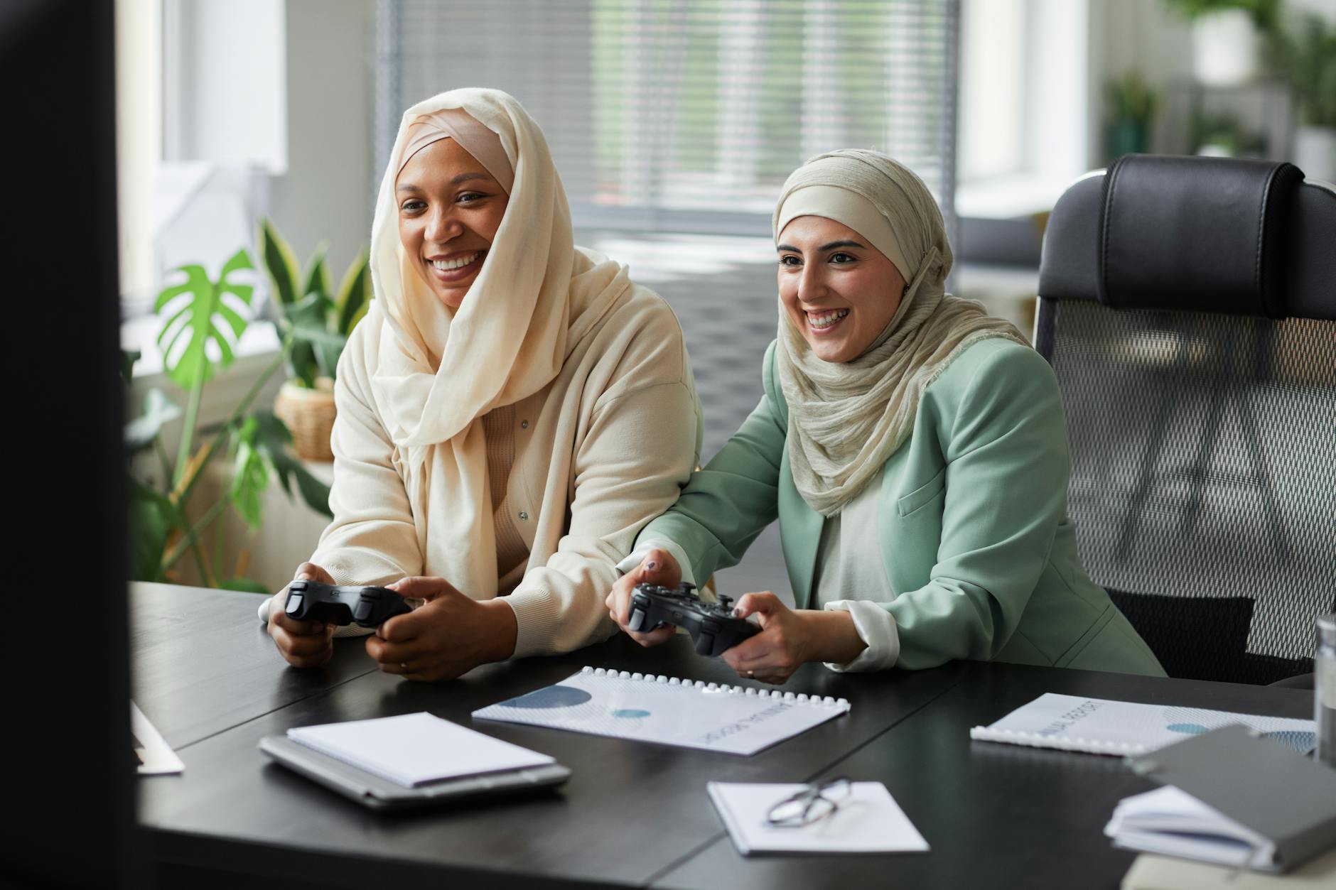Person using adaptive gaming equipment in comfortable gaming setup