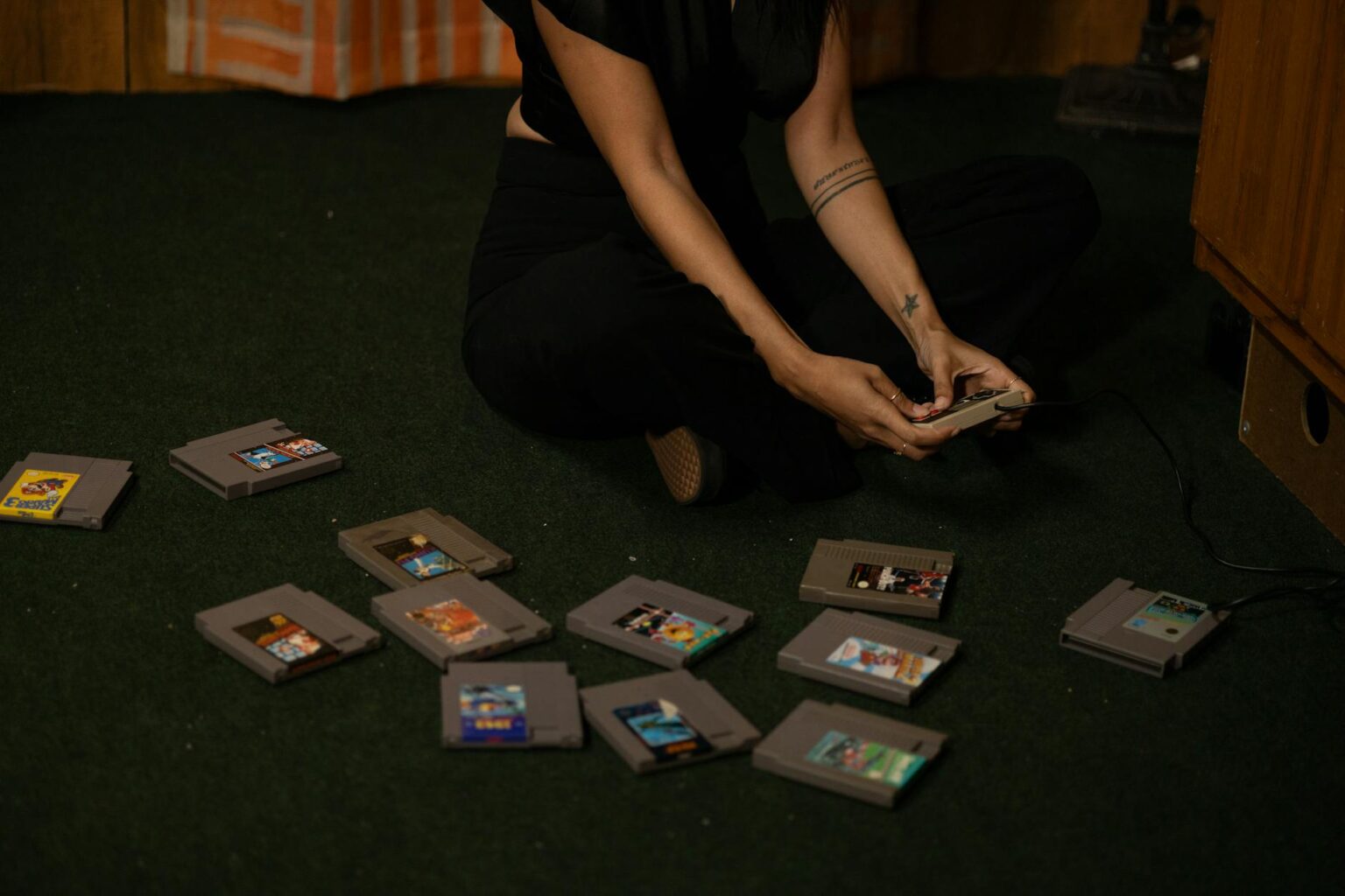 Switch Cartridge Manufacturing Delays Are Creating Collector Markets Collection of Nintendo Switch game cartridges arranged on a surface
