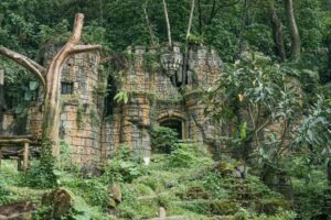 Stone ruins surrounded by dense jungle foliage, evoking an adventurous platformer environment