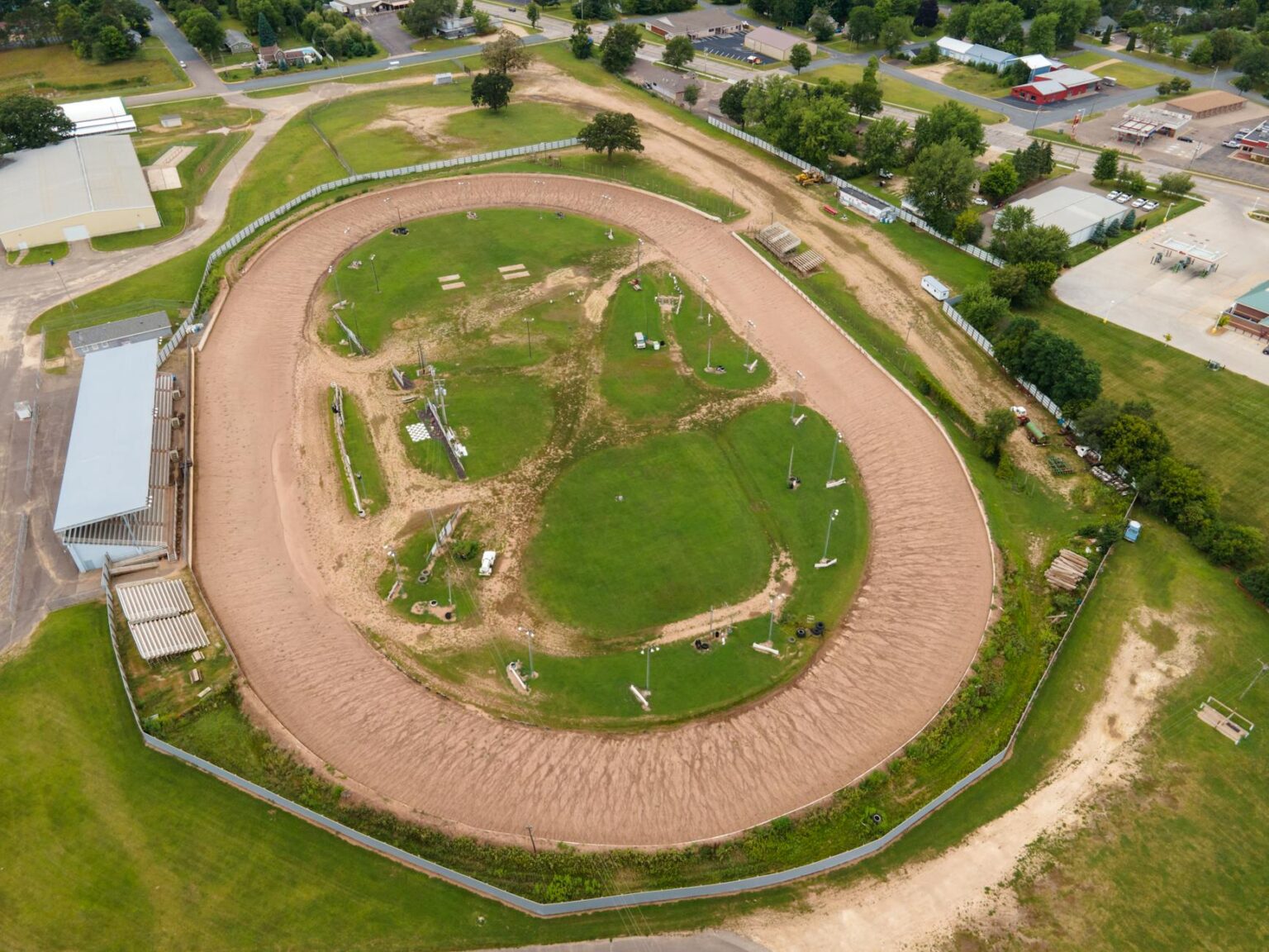 Mario Kart World’s Track Recycling Is Frustrating Longtime Fans Aerial view of a colorful racing track representing Mario Kart World course design