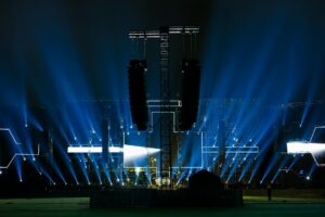 Colorful concert stage with dramatic lighting and effects