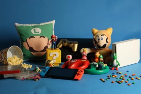 A Nintendo Switch console displayed on a table representing gaming hardware sales