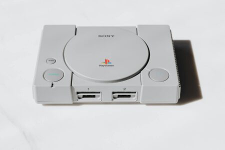 A classic retro gaming console on a flat surface, representing older Nintendo hardware generations