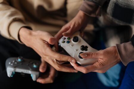 A game controller resting on a surface, representing strategy gaming on Nintendo platforms