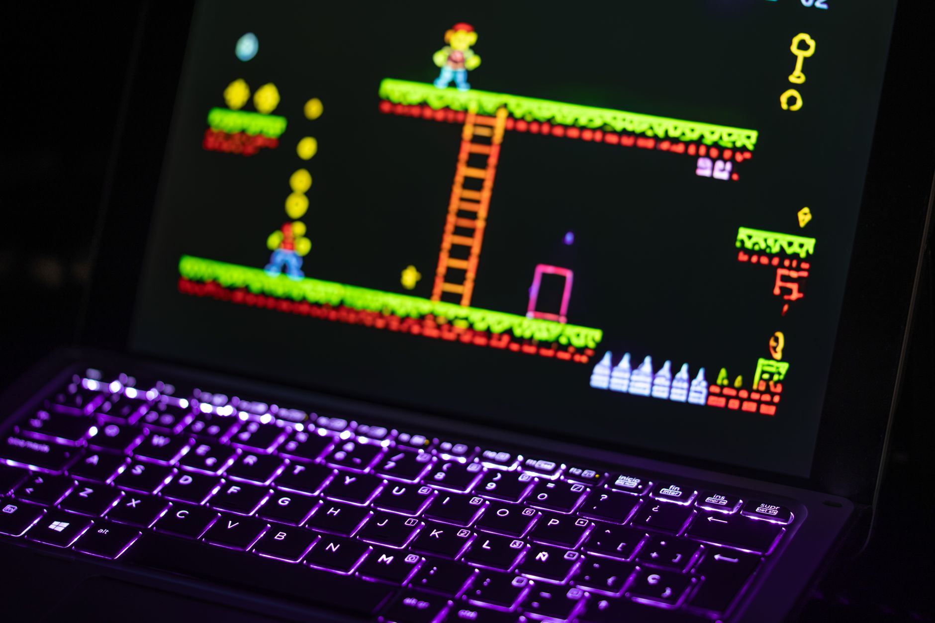 A gaming laptop on a desk displaying a digital storefront interface