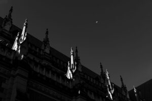 Dark gothic stone architecture evoking the aesthetic of Bloodborne's Victorian horror setting
