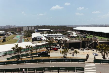 Aerial view of a racing track suggesting high-speed competitive racing