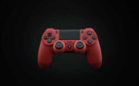 Helldivers 2’s Seasonal Slowdown Is Testing Its Playerbase Loyalty A gaming controller resting on a dark surface, representing Helldivers 2 player engagement