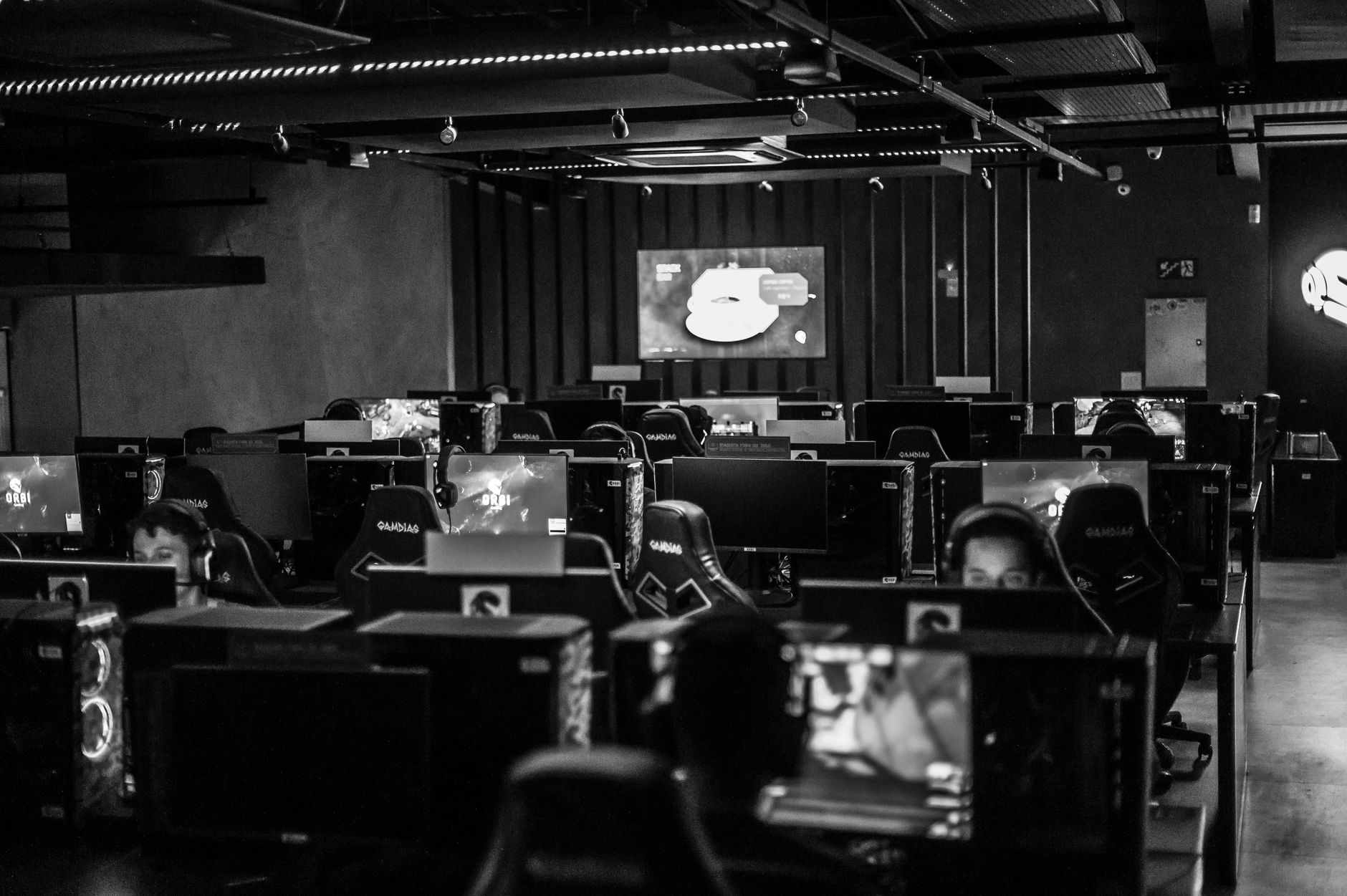 Lit esports arena stage setup for a competitive gaming event