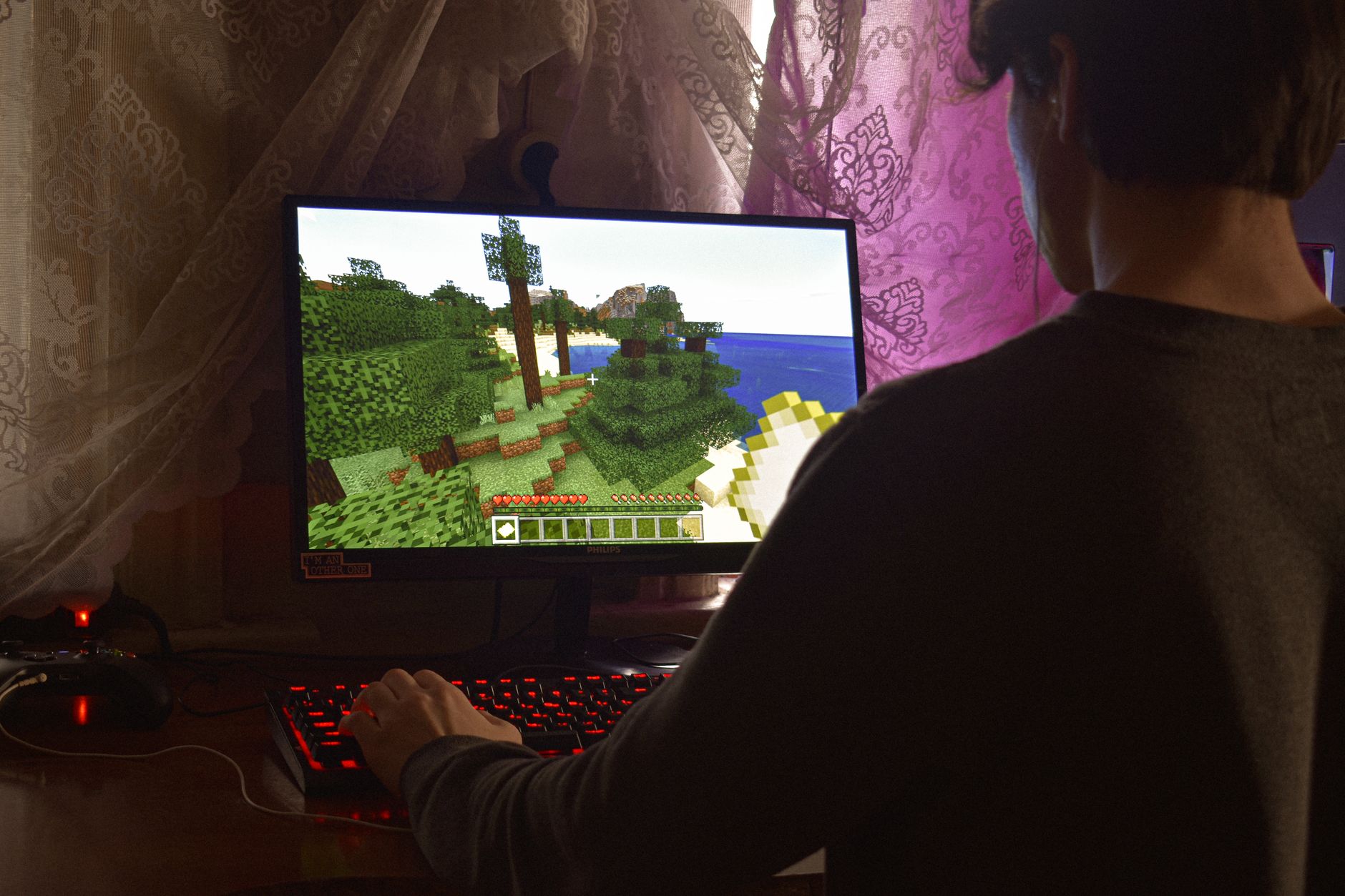 A gamer staring at a screen, representing the long wait for a franchise revival