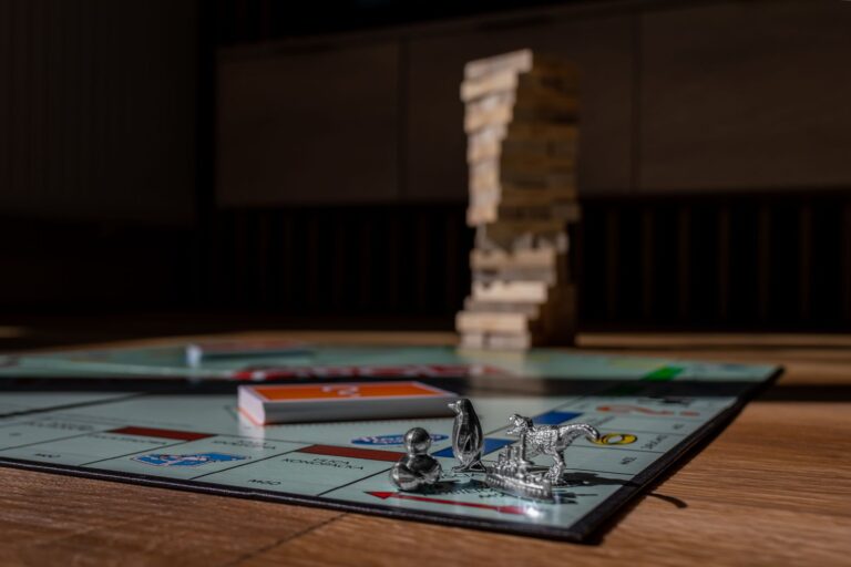 A turn-based strategy board game laid out on a table, representing tactical gameplay similar to Advance Wars