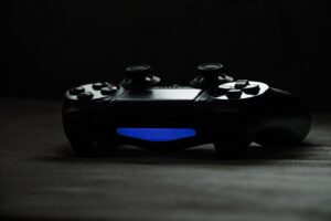 Donkey Kong Bananza’s Boss Rush Gaps Are Deflating Replay Value A game controller resting on a surface, representing console gaming and replay experience