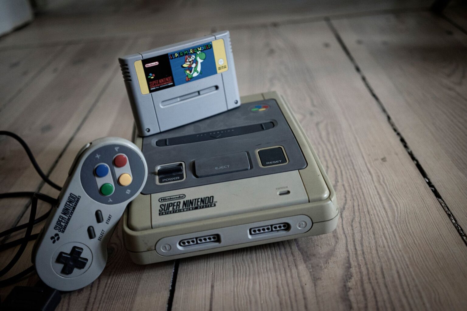 A retro gaming console on a table, representing classic video game nostalgia