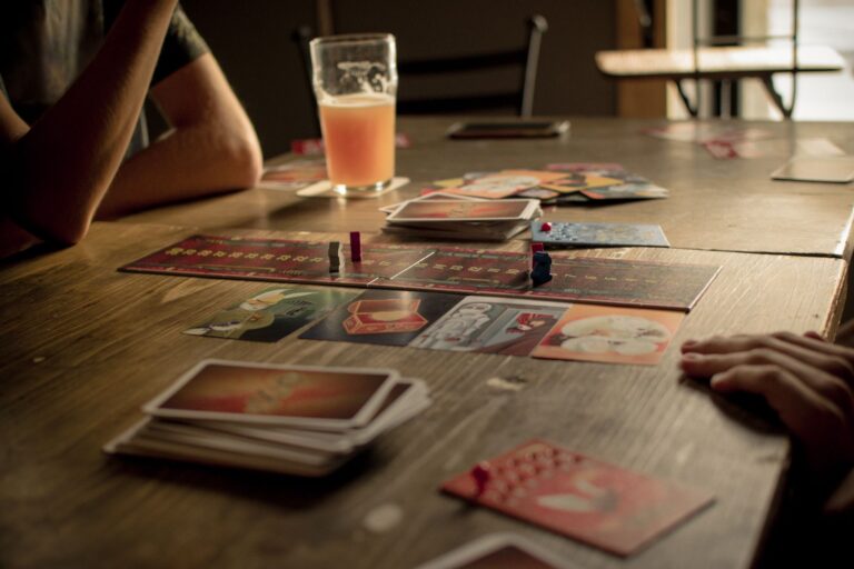 Close-up of a strategy board game with pieces arranged mid-match, representing tactical gameplay