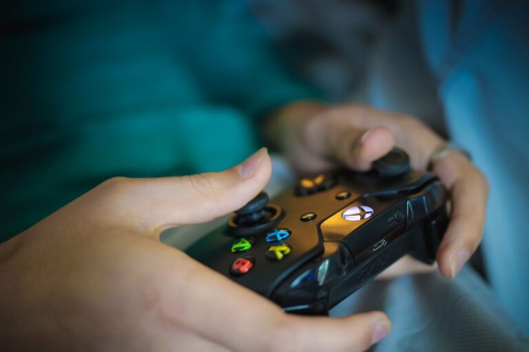 A game controller resting on a surface, representing anticipation around Donkey Kong Bananza's release