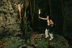 A player exploring a vibrant jungle platformer environment with collectibles visible on screen