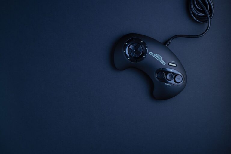 A retro gaming controller resting on a surface, evoking classic console gaming nostalgia