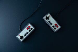 A vintage gaming controller resting on a surface, evoking classic console gaming nostalgia