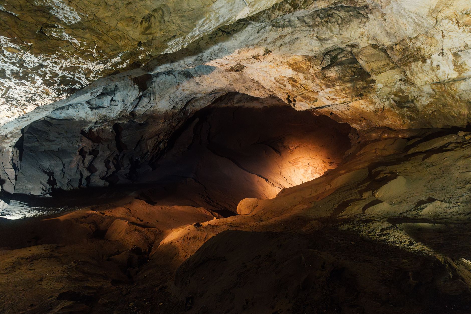 Dark underground cave environment with rocky formations