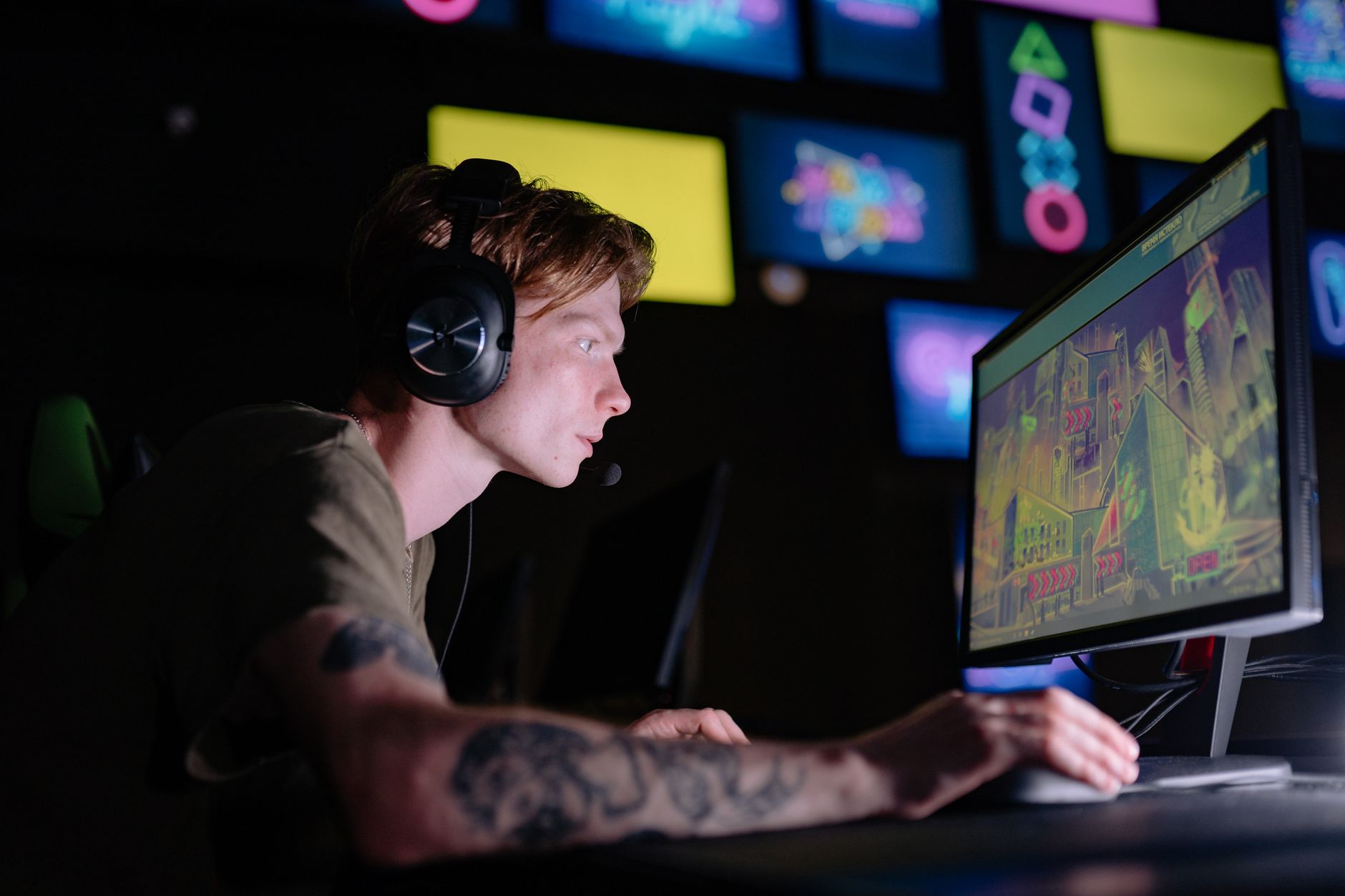 A focused gamer in front of a screen, representing the intensity of speedrun attempts