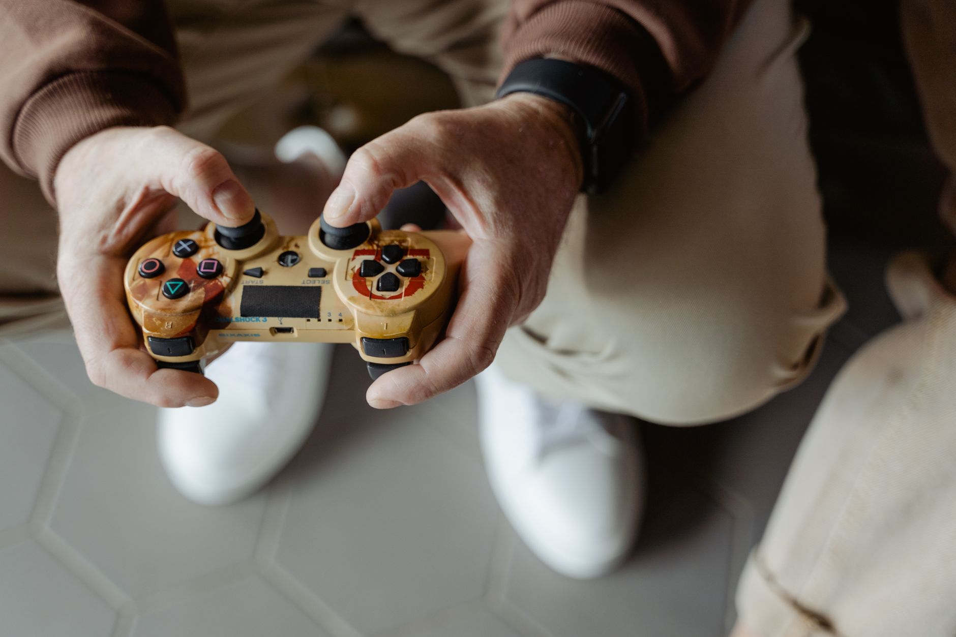 Gaming controller resting on a surface representing console gaming culture